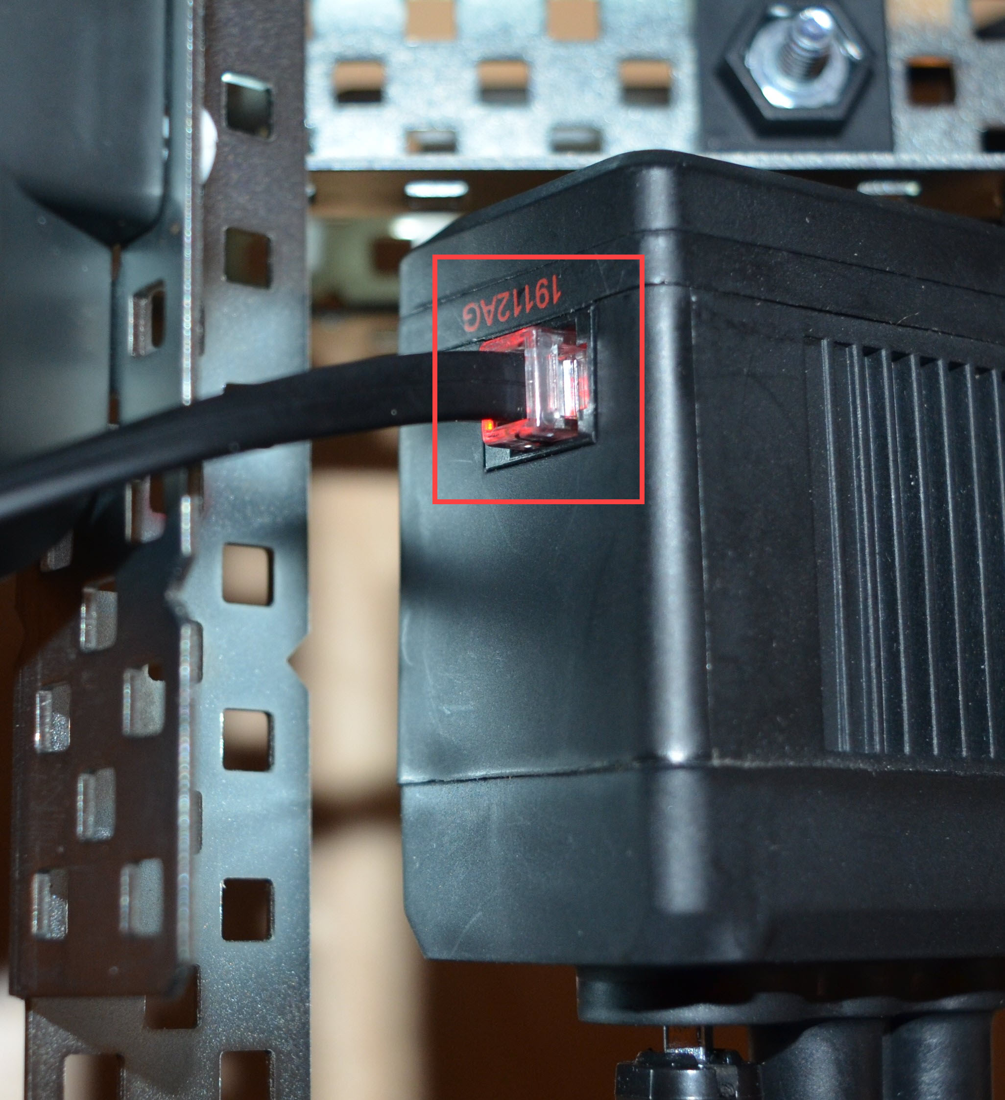 Red LED light on the V5 Smart Motor's Smart Port is shown glowing red and is highlighted.