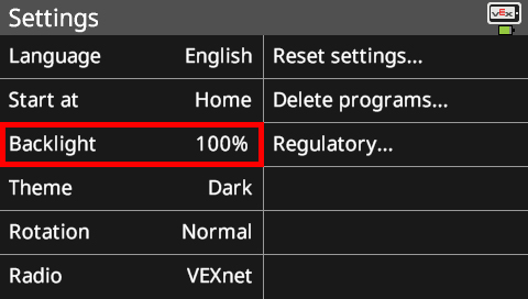 Brain screen is shown in the Settings menu with the Backlight option highlighted. This menu has many options that can be customized. The options in this screenshot read Language English, Start at Home, Backlight 100%, Theme Dark, Rotation Normal, and Radio VEXnet. There are also system options on the right that read Reset settings, Delete programs, and Regulatory.