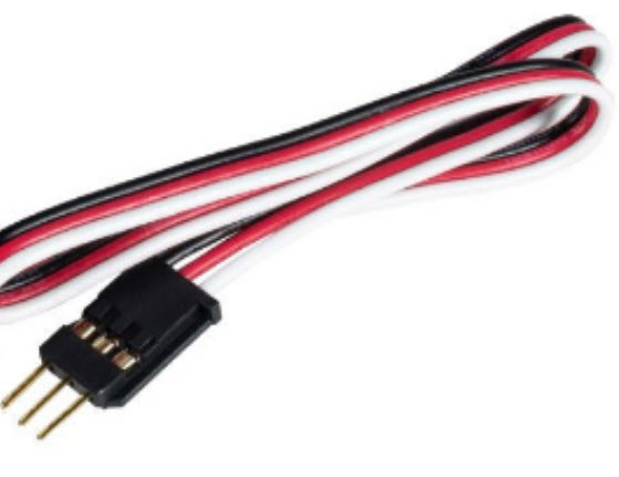 Close up of the Digital In device to view its three different wires. The device has three individual rubber wires, color coded black, red, and white.