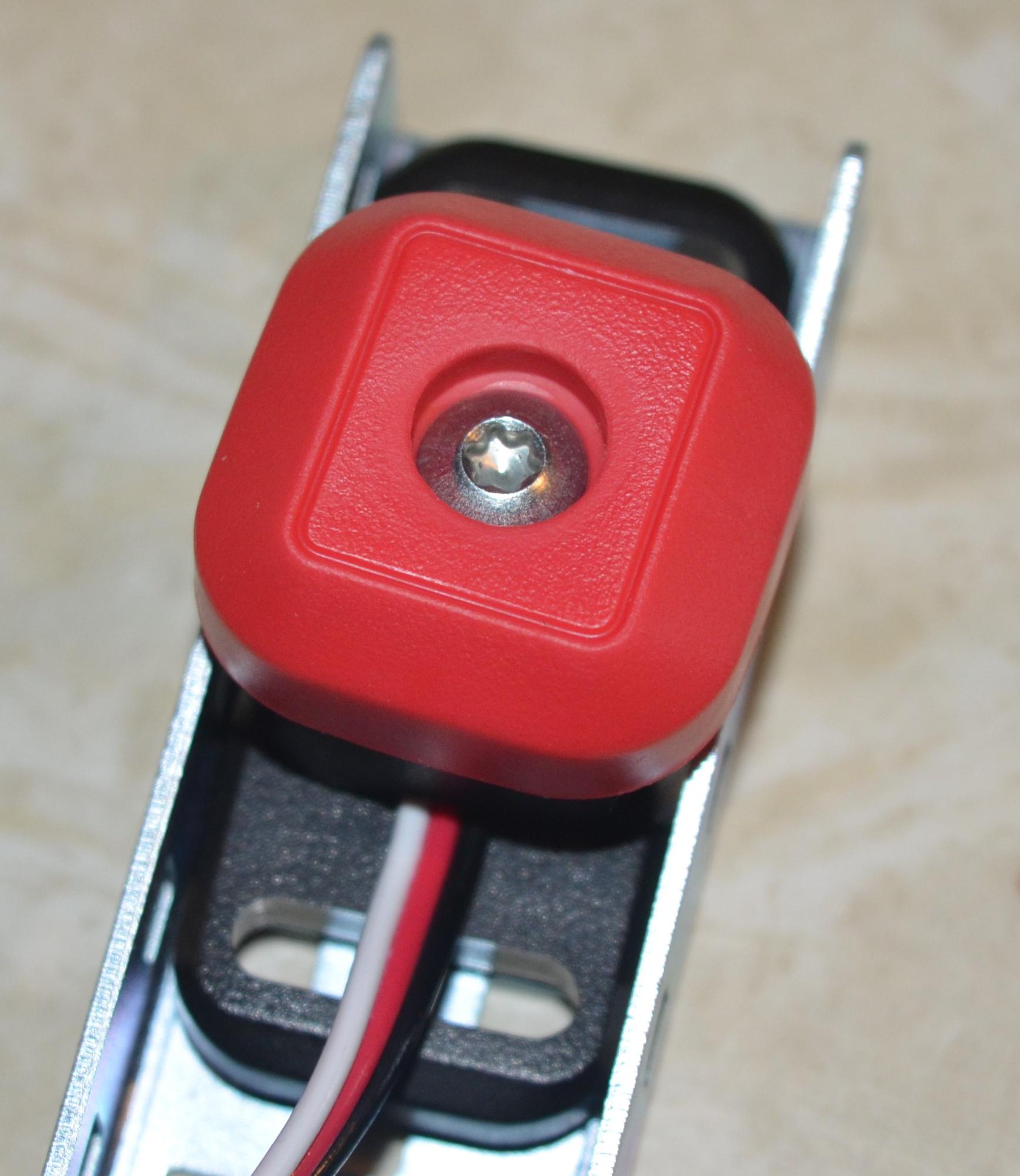 Close up of the Bumper Switch device nested into a 1x2x1 C-Channel piece.