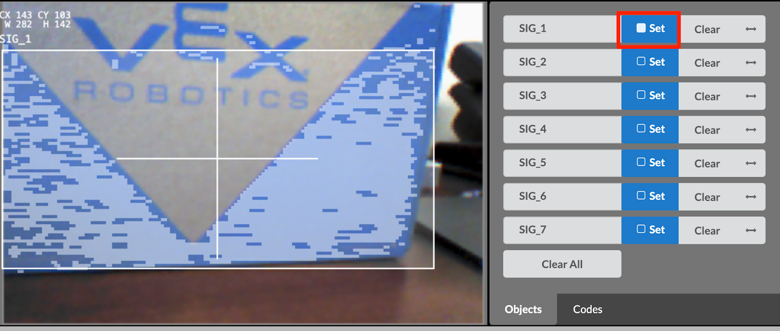 Knappen Set bredvid signaturen SIG_1 har valts, och nu är hela det blå området på rutan markerat och identifierat av synsensorn.