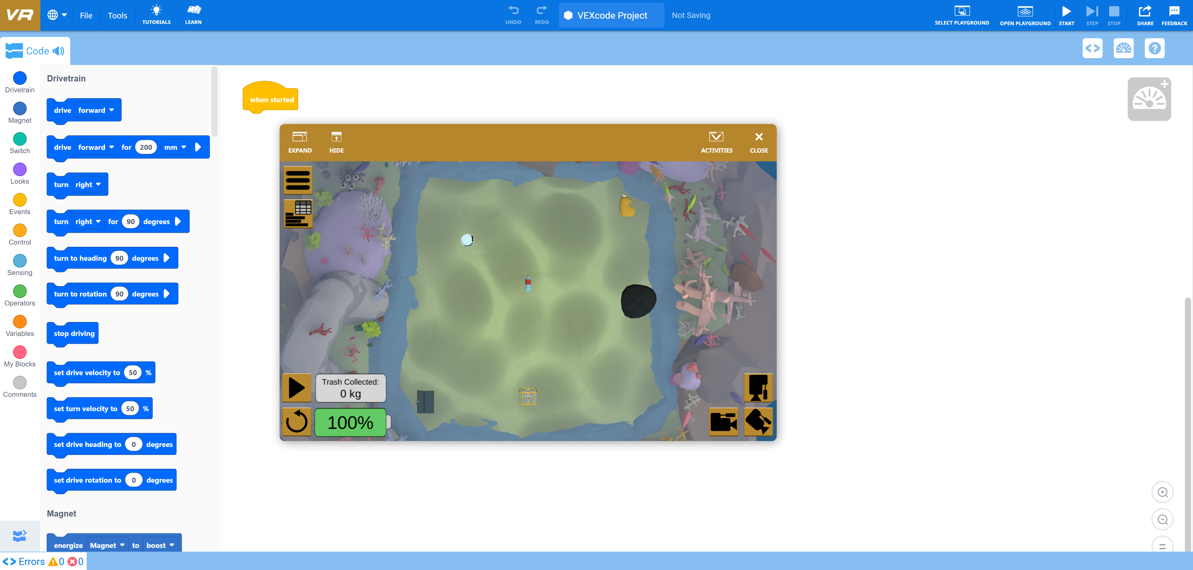 Interface de programação VEXcode VR com o ambiente de simulação Coral Reef Cleanup aberto numa janela de simulação.