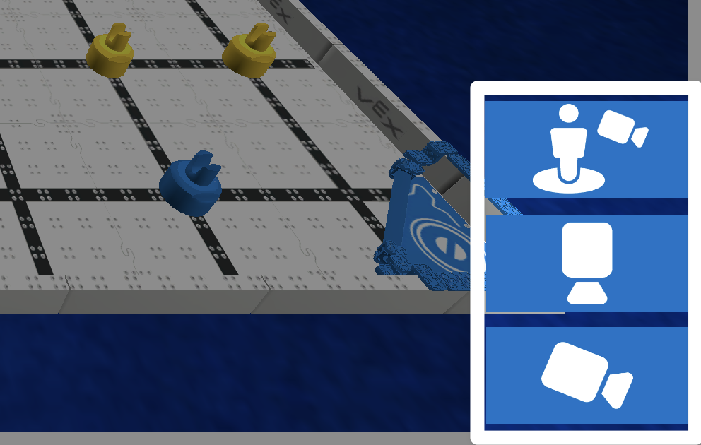 Stambus apatinio dešiniojo praktikos lango kampo ekrano vaizdas su paryškintais trimis kameros vaizdo parinkčių mygtukais. Viršutinis mygtukas yra vairuotojo stoties perspektyva, antrasis – vaizdas iš viršaus, o trečiasis – persekiojimo kamera.