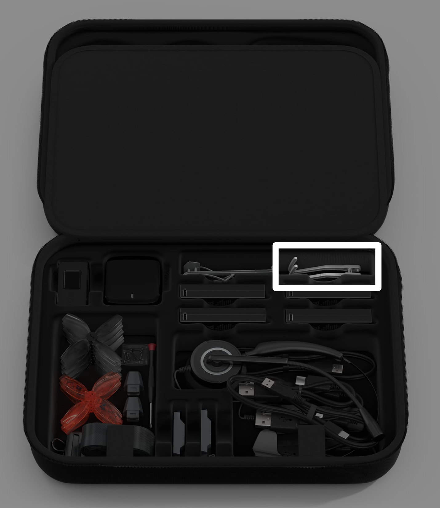 Koffer für das VEX AIR Drone Kit mit einem Hinweis auf den Haken für das motorisierte Modul im oberen rechten Teil des Koffers.