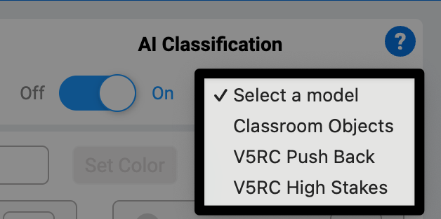 เมนูยูทิลิตี้ AI Vision พร้อมเมนูแบบเลื่อนลงของ AI Classification Model เปิดอยู่ โมเดล Classroom Objects จะถูกเลือกไว้ตามค่าเริ่มต้น และตัวเลือกทั้งสามคือ Classroom Objects, V5RC Push Back และ V5RC High Stakes