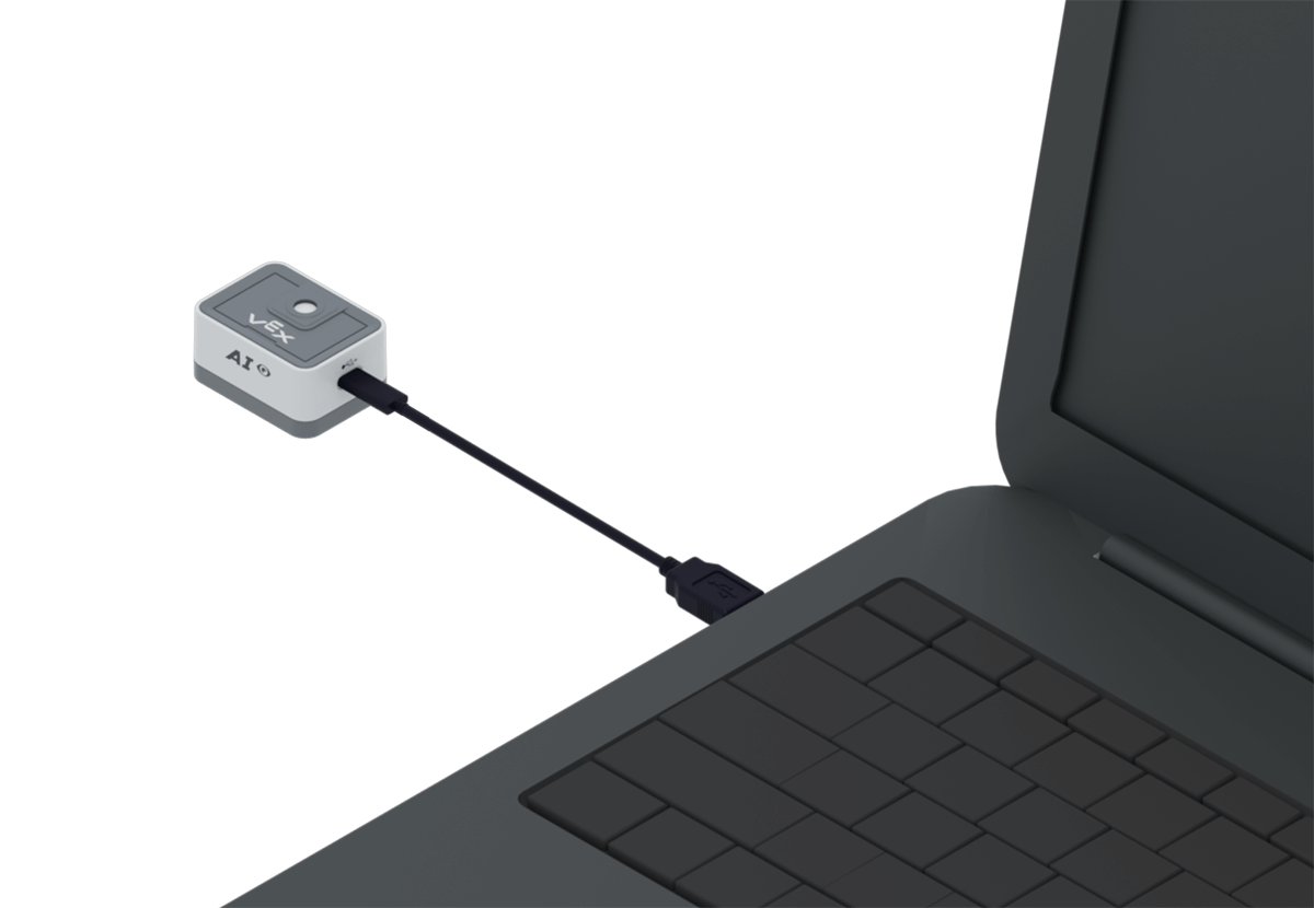 Sensor de visión VEX IQ AI conectado a una computadora mediante un cable USB.