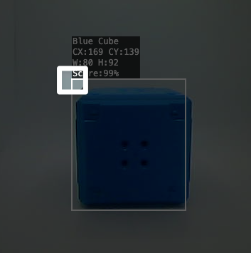 Cận cảnh Blue Cube được AI Vision trong Tiện ích phát hiện. Một điểm nổi bật sẽ chỉ ra góc trên bên trái của hộp xung quanh Khối lập phương xanh, cho biết điểm gốc.