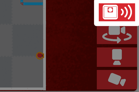 Ein Screenshot in Nahaufnahme zeigt die Schaltflächen in der unteren rechten Ecke des Playground-Fensters. Die Schaltfläche „AI Vision“ befindet sich ganz oben und zeigt ein weißes Sensorsymbol, das Wellen aussendet und über der Orbitkamera hervorgehoben ist.