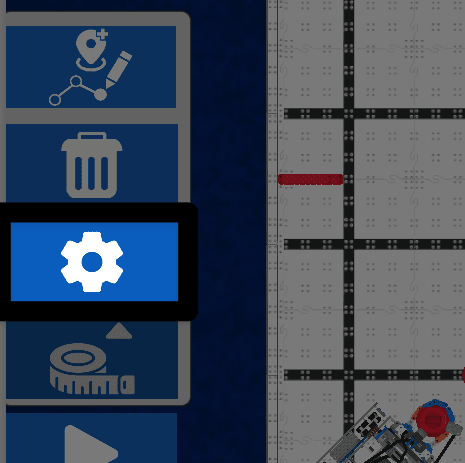 Uma captura de ecrã de grande plano do canto inferior esquerdo do Mix and Match Playground, com os botões do Navigation Kit abertos. O botão Definições, um ícone de engrenagem branca, é o terceiro botão a contar de cima, entre o ícone do caixote do lixo e o ícone da fita métrica.