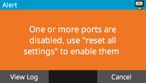 V5 Brain screen is shown with an alert that reads One more more ports are disabled, use Reset all settings to enable them. There are two options below reading View Log and Cancel.
