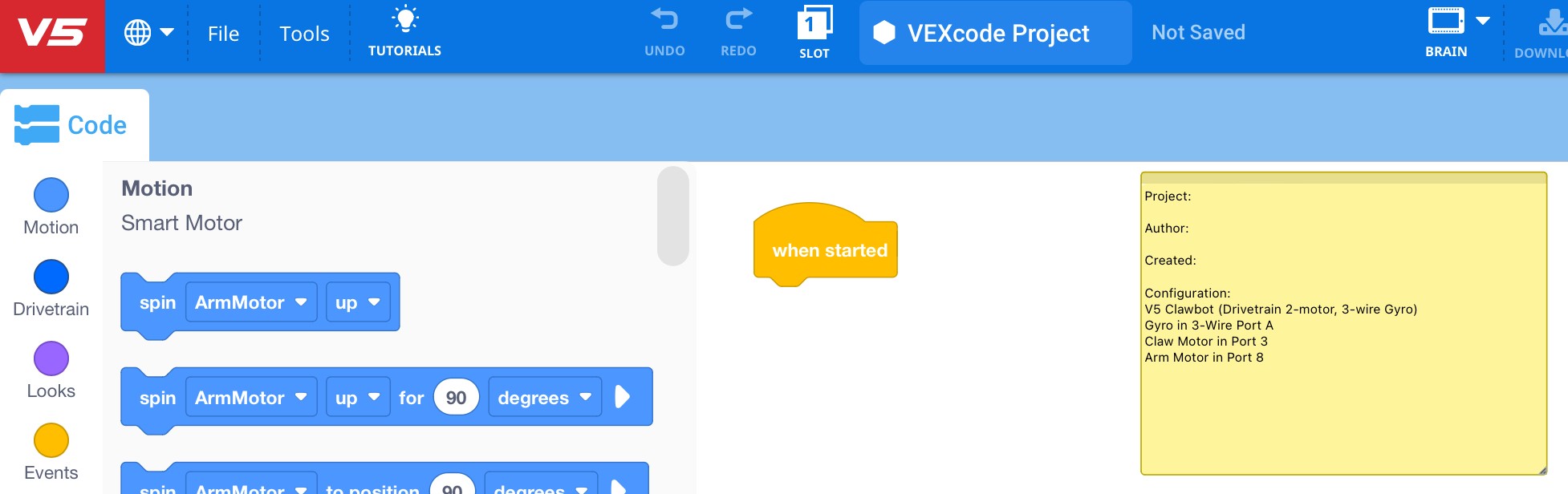 VEXcode V5 with a template Example Project opened, including configured devices and a note with a description of the project.