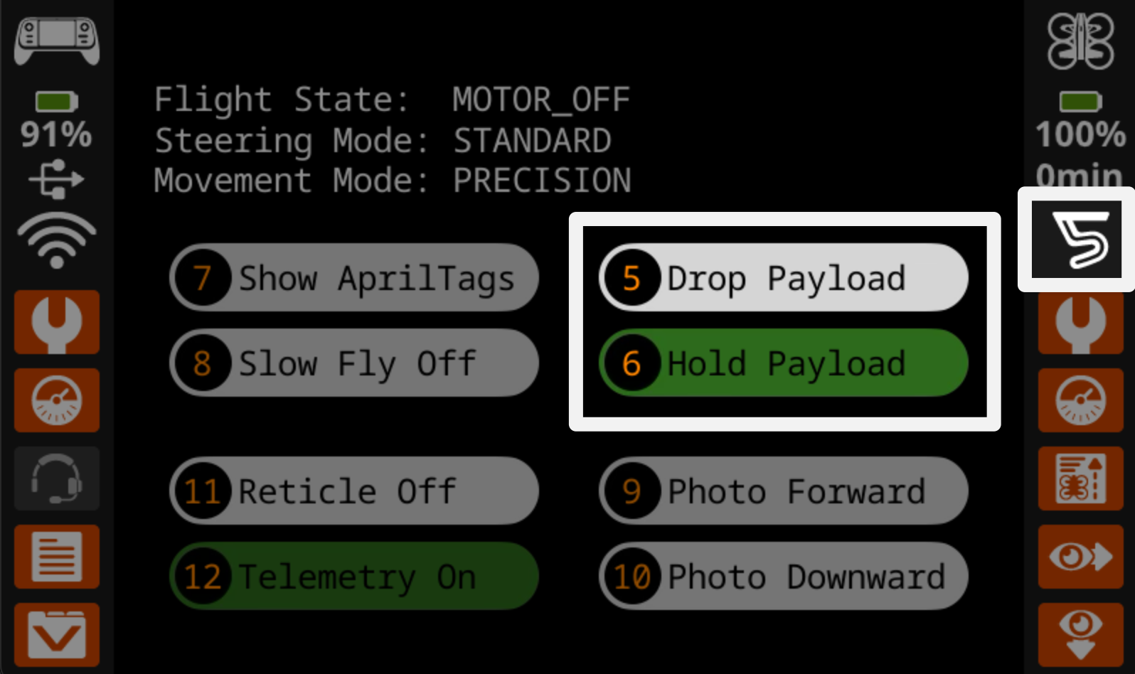 The controller screen during flight with the button 5 that reads Drop Payload and button 6 that reads Hold Payload on the right hand side highlighted, as well as the hook icon on the far right of the screen above the drone settings icon.