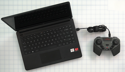 V5 Controller is connected to a laptop using a USB-C cable.