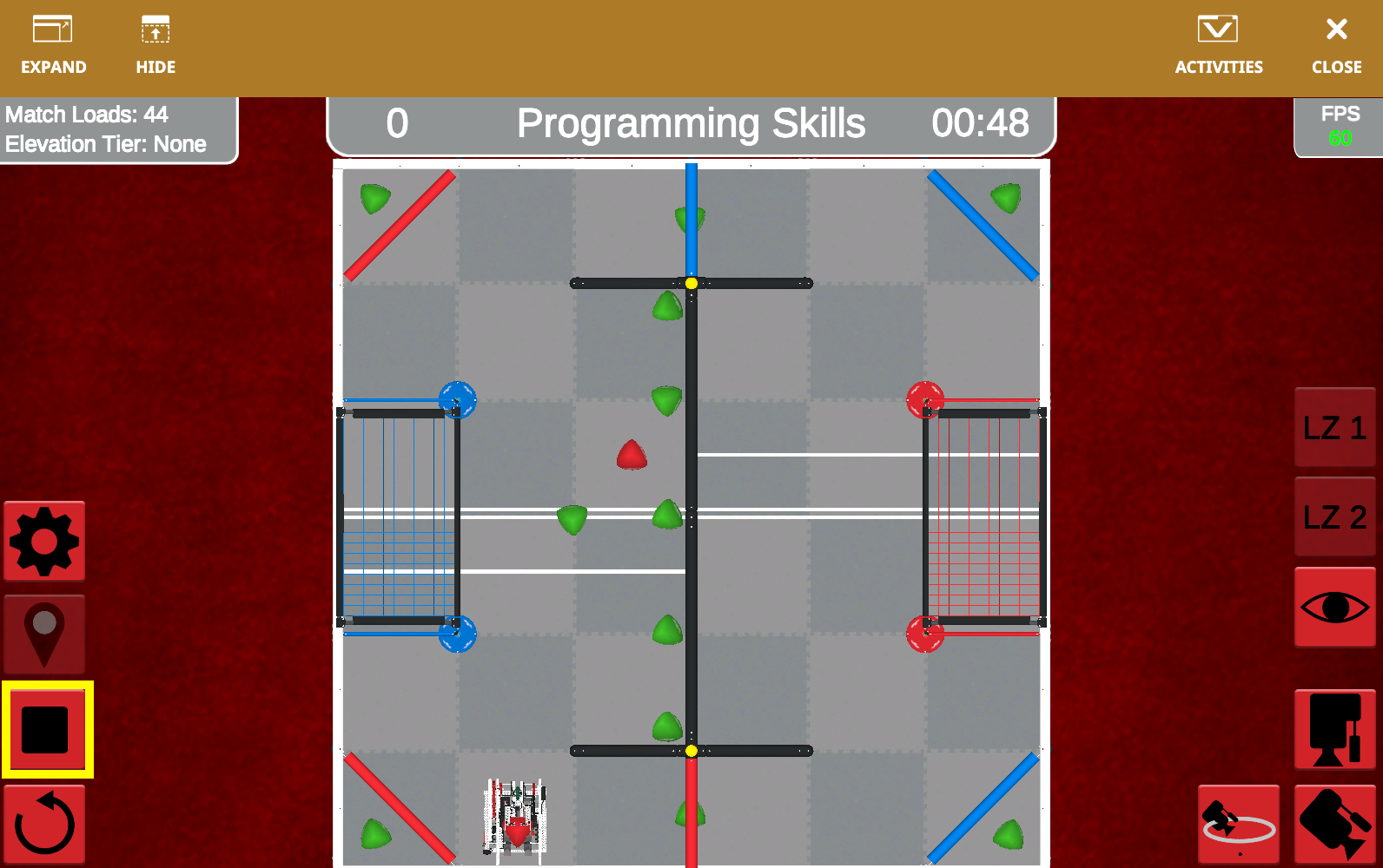 V5RC Over Under Playground field showing scoring zones, barriers, and starting positions in VEXcode VR