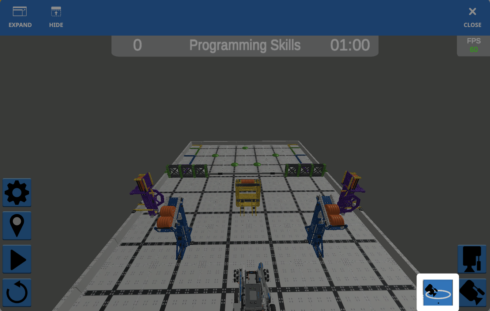 The Playground Window with a view of the Field from further away, in a perspective view, wit ha camera in a circle icon in the lower right corner highlighted.