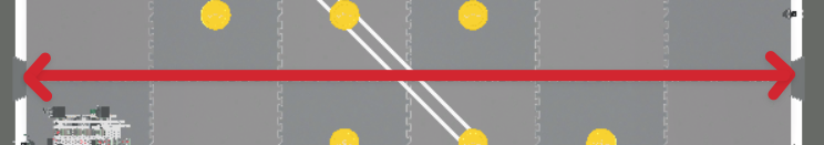 A closeup of the center cross-section of the field with an arrow connecting the two inside edges of the walls across the center of the field.
