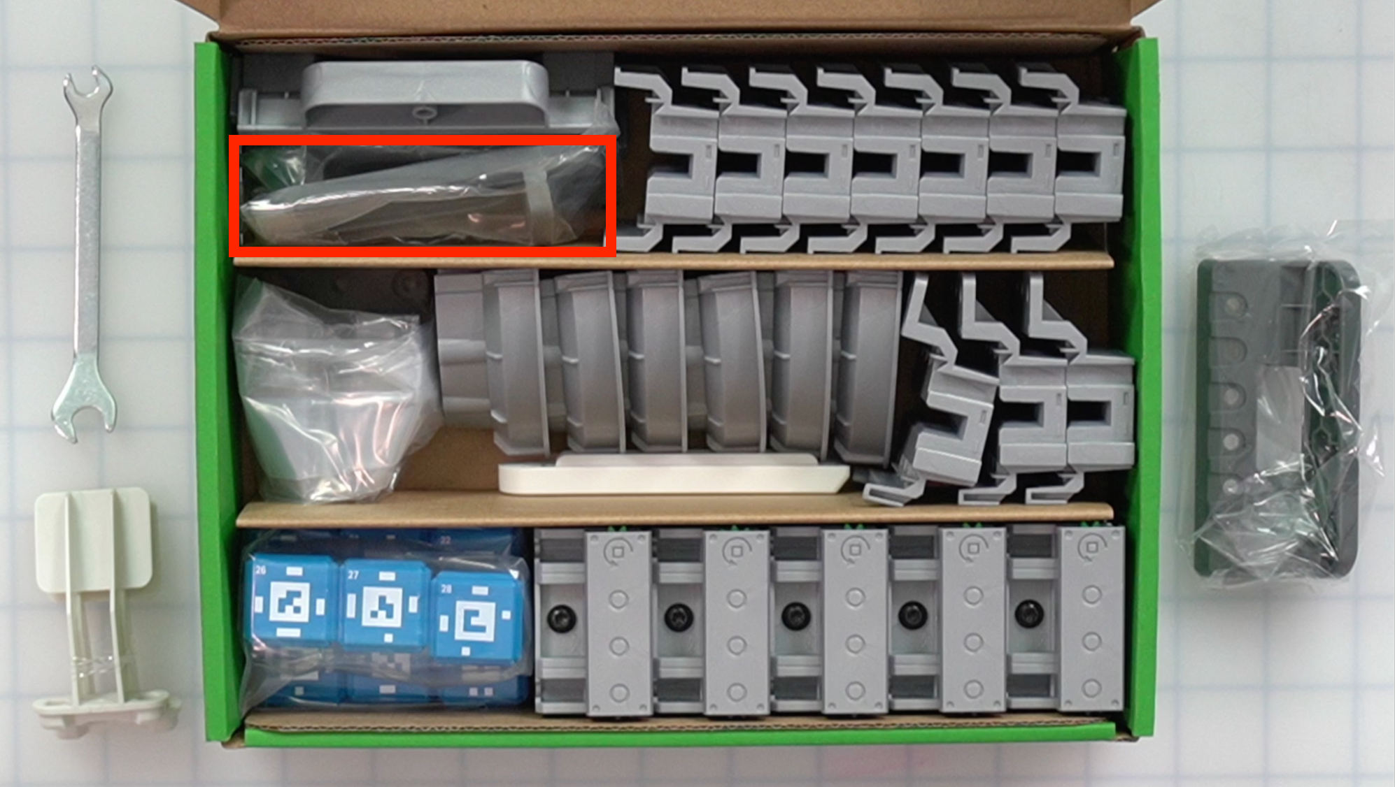 CTE Workcell Kit parts locations on the center left of the box.