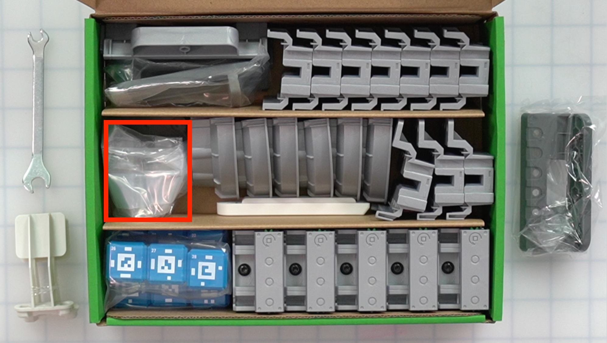 CTE Workcell Kit parts locations on the center far left of the box.