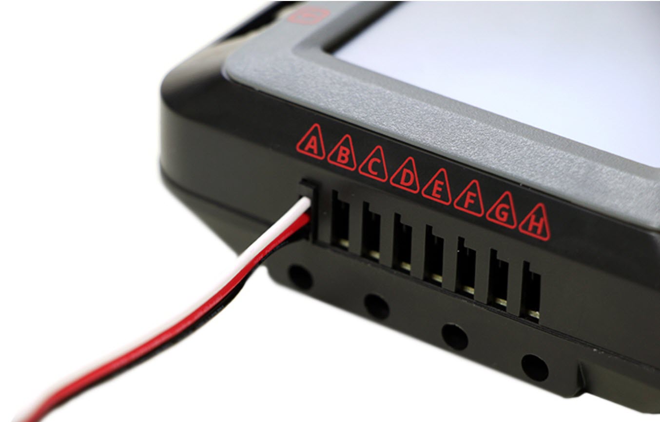 Close-up of VEX V5 Brain showing 3-Wire cable fully inserted into 3-Wire port A.