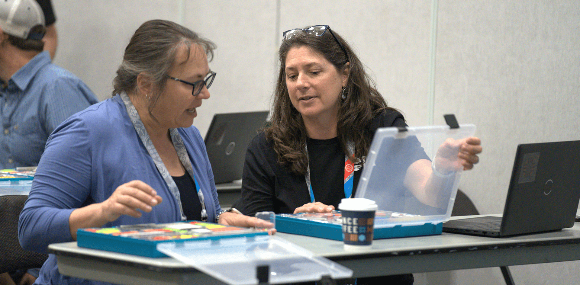 Educators collaborating in a professional learning community to share ideas and support teaching with VEX PD+