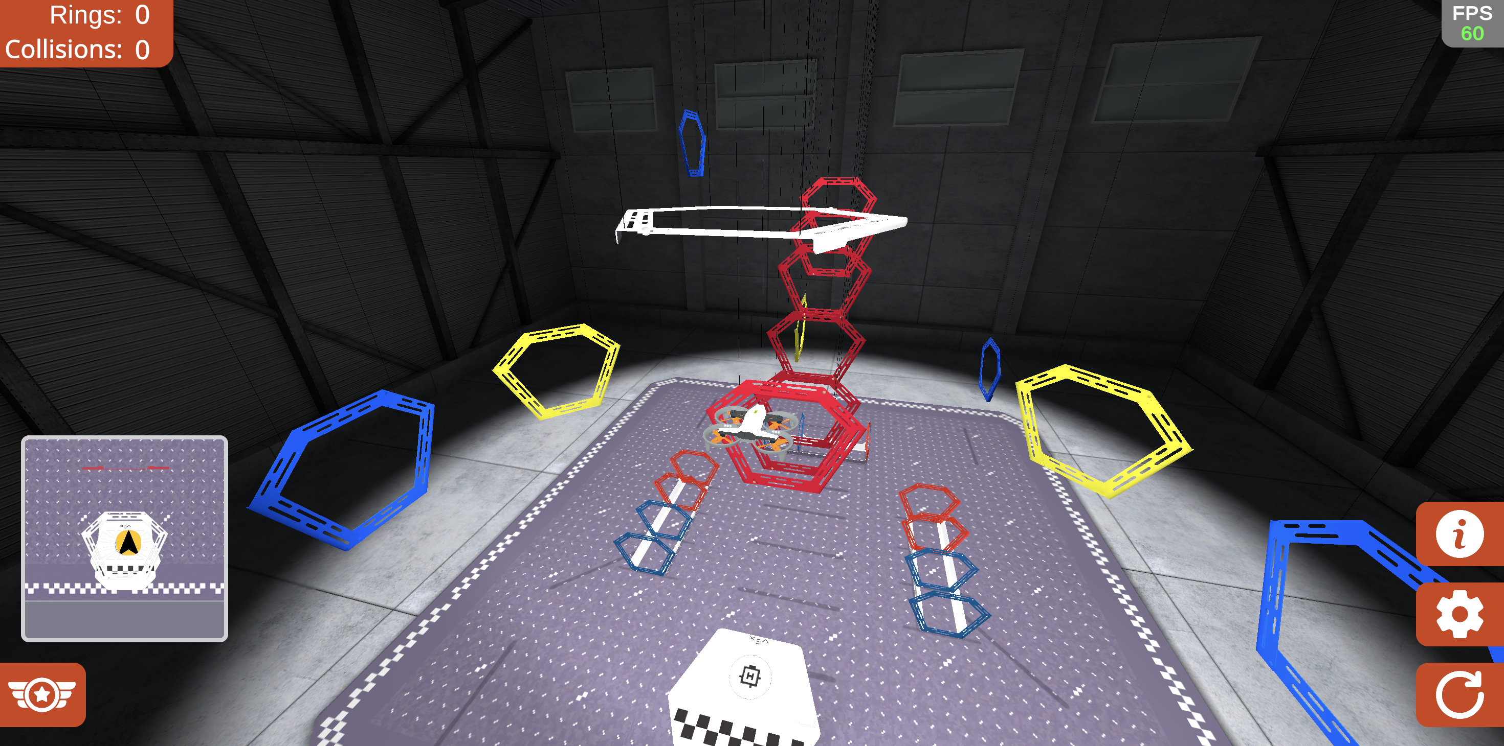 Ring layout in the simulator with a drone in midair. It is surrounded by different colored rings hovering above a field.