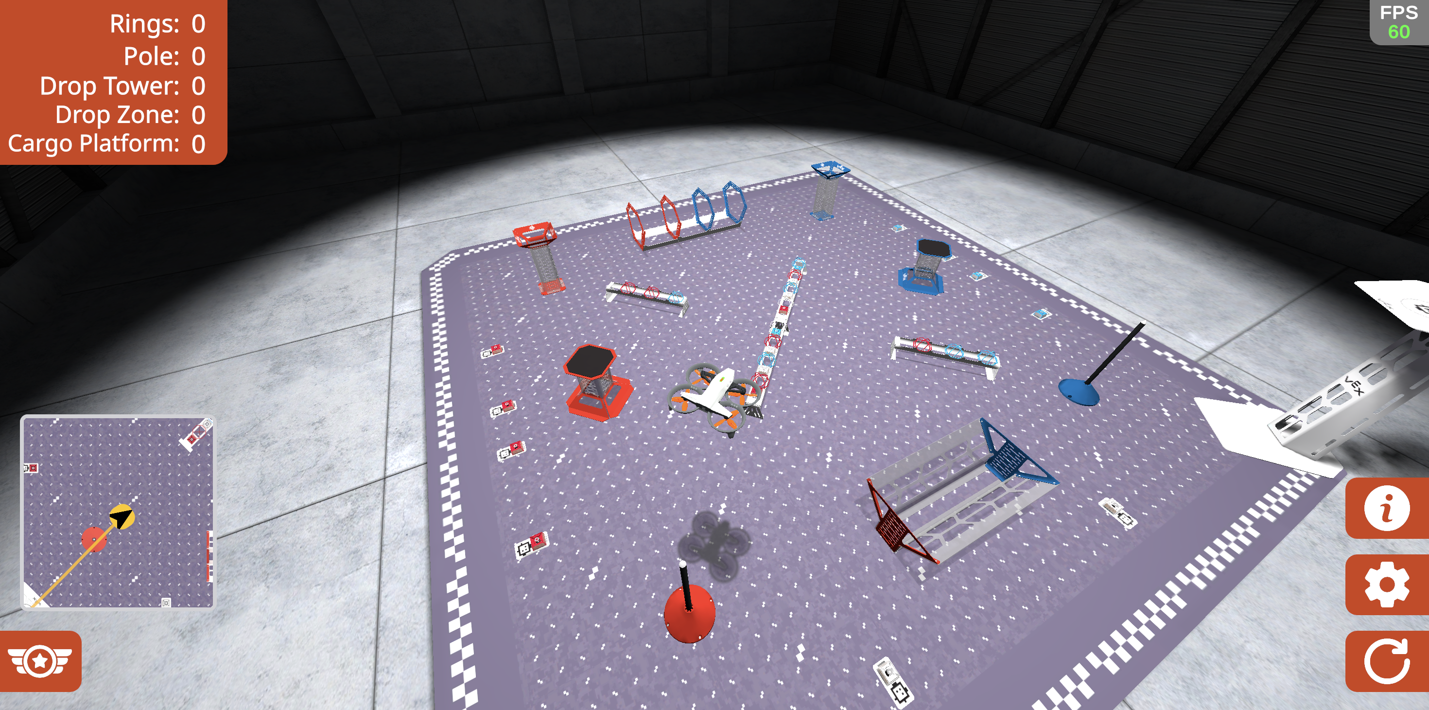 Drone on the competition layout in the simulator. A variety of game objects and goals can be seen on the field beneath the drone.