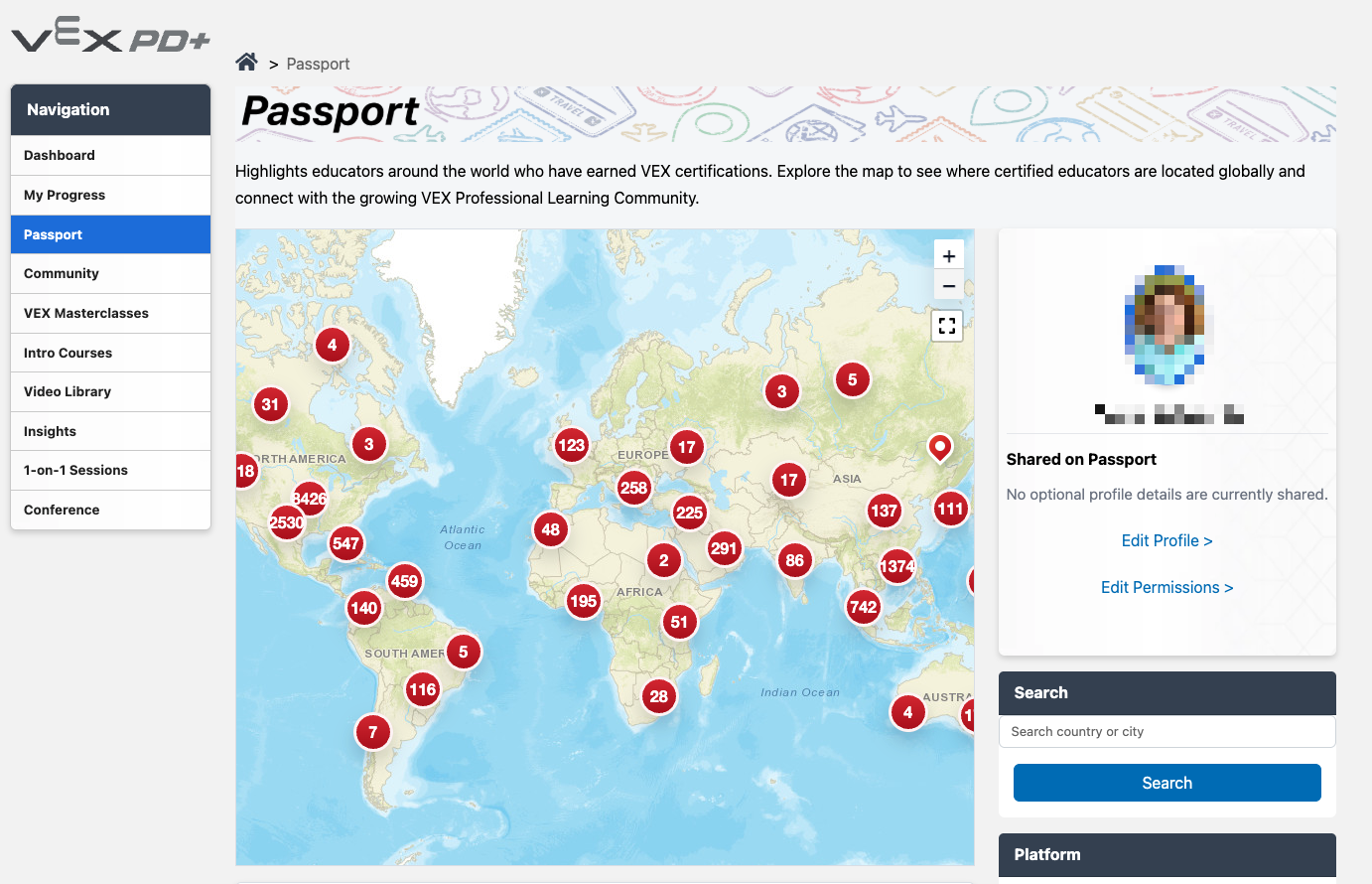 A screenshot of the VEX Passport page in PD+. On the left, the Passport option is selected in the Navigation. The Passport page features a large world map in the center with numbers in circles indicating VEX educators globally. On the right profile information is shown, with a search bar below it.