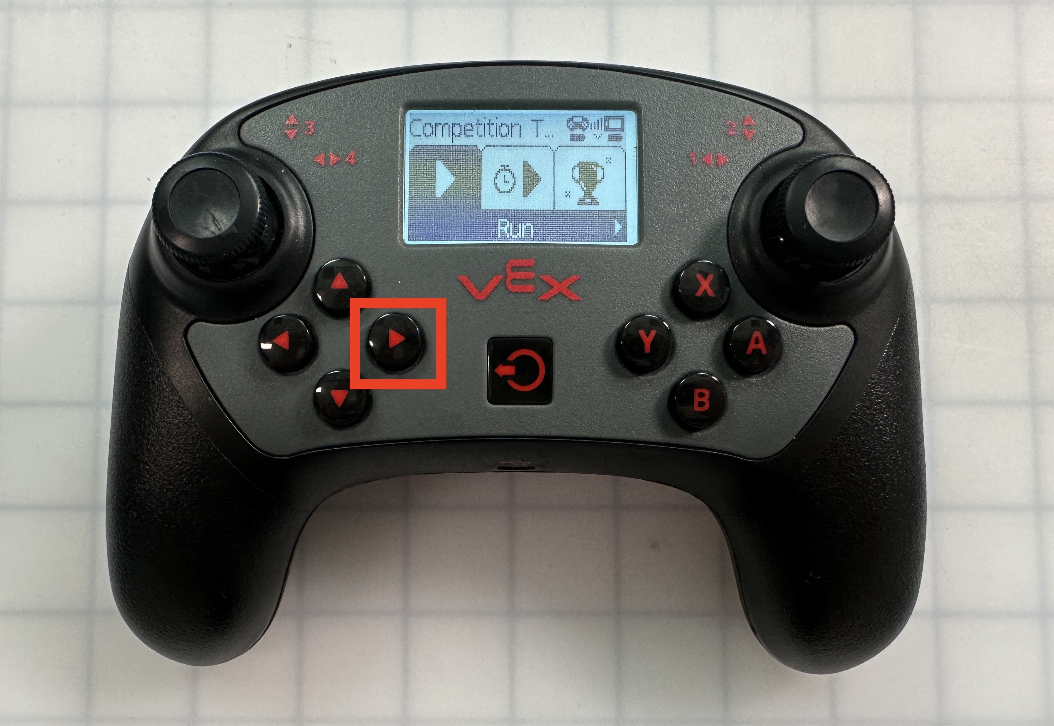 V5 Controller is shown with the Compeition Template project menu open and the Run option selected. The right arrow button is highlighted.