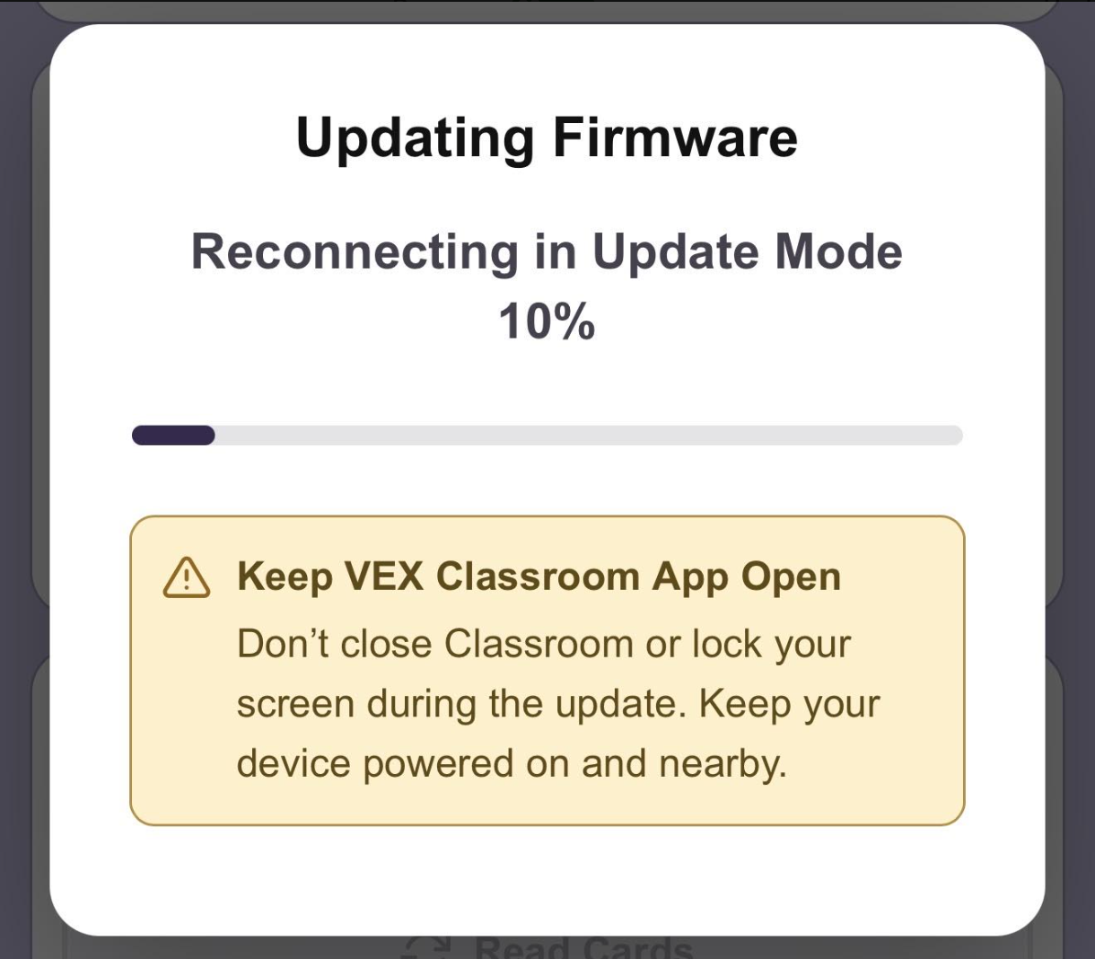 Pop up reading Updating Firmware with a progress bar underneath.