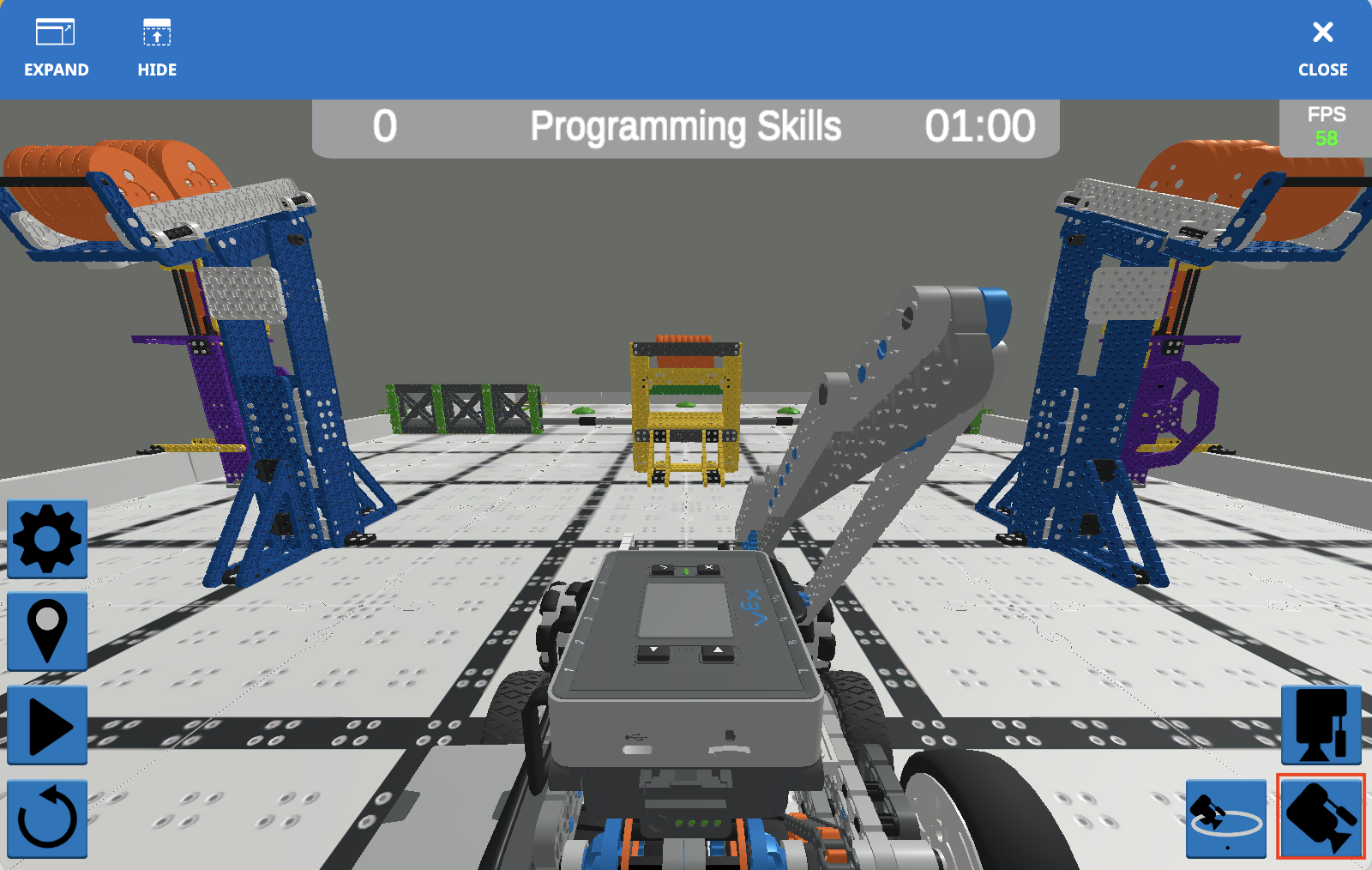 Screenshot of VEXcode VR interface showcasing the VIQC Slapshot (2022-2023) programming environment, featuring block-based coding options for users to create and test code for a virtual robot.
